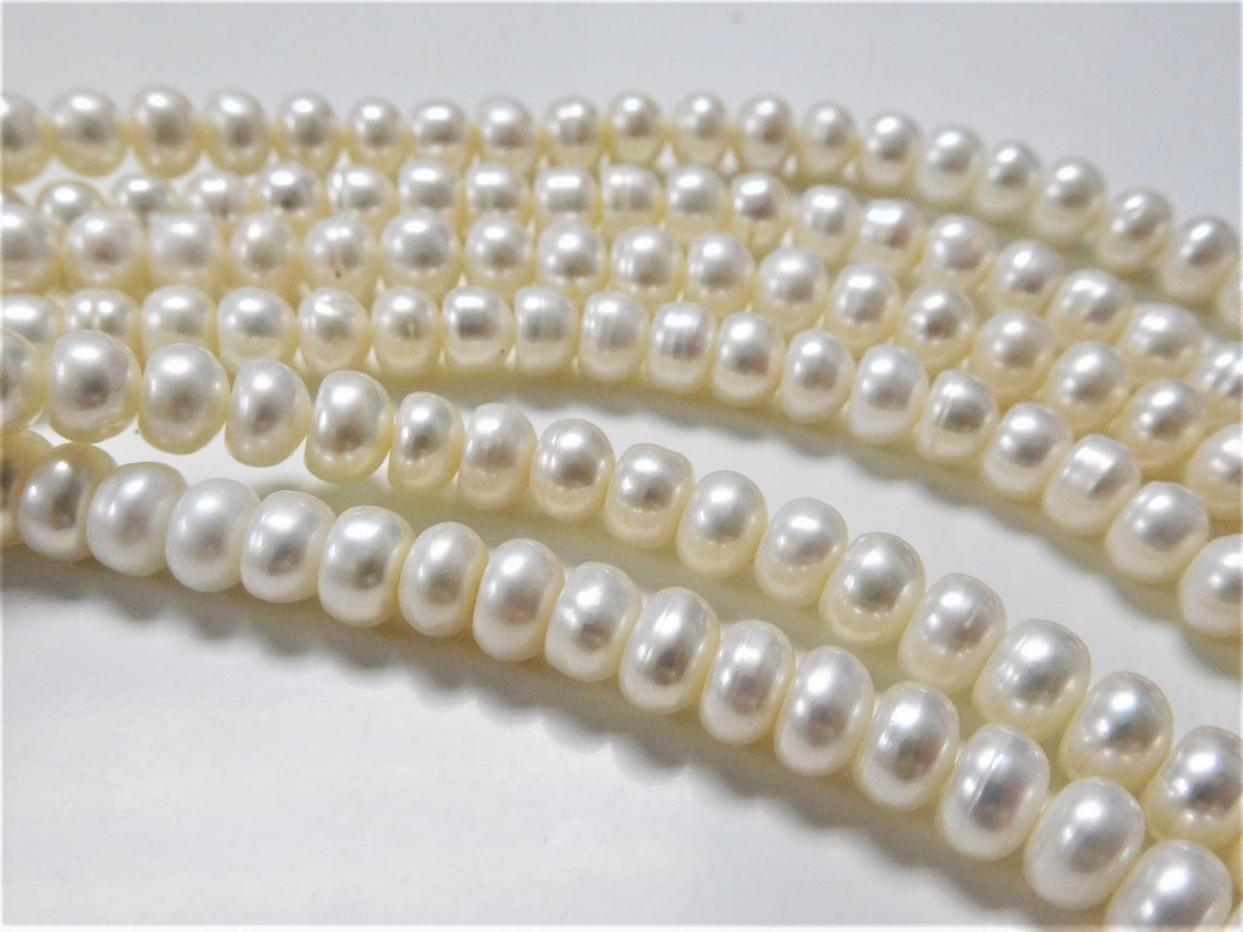 6-7mm Oval Freshwater Pearls, White (16 Strand)